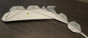 A print made with a crease cut made by die cutting at DuraTech Industries. 